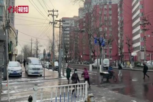 北京城区迎2021年第一场雪