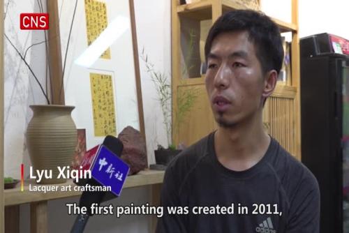 Young craftsman devoted to traditional Chinese lacquer artworks