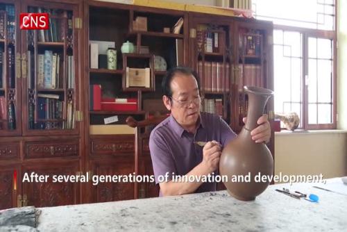 Man makes traditional black pottery glow with new color
