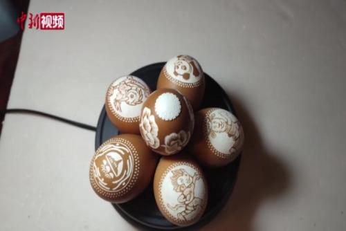 雞蛋殼上雕刻十四運吉祥物
