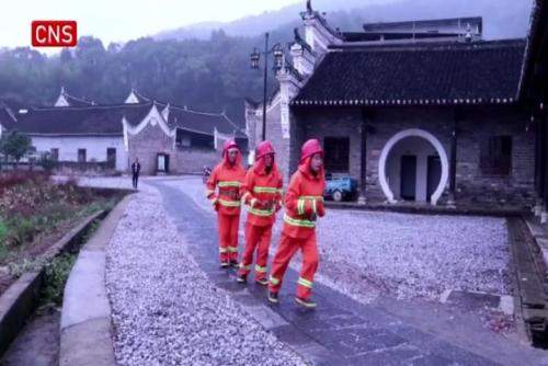 Female fire brigade volunteers guard century-old homes in Hunan