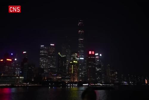 Shanghai landmarks turn down their lights to save power