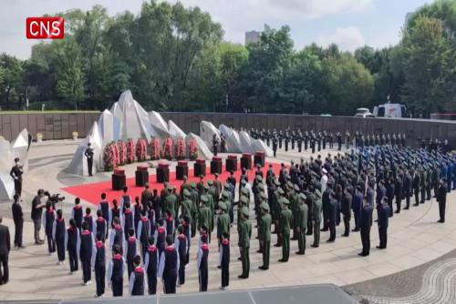 Burial ceremony for remains of 88 martyrs held in Shenyang