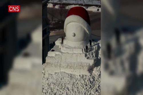 Time-lapse video shows building process of 18-meter-high snowman