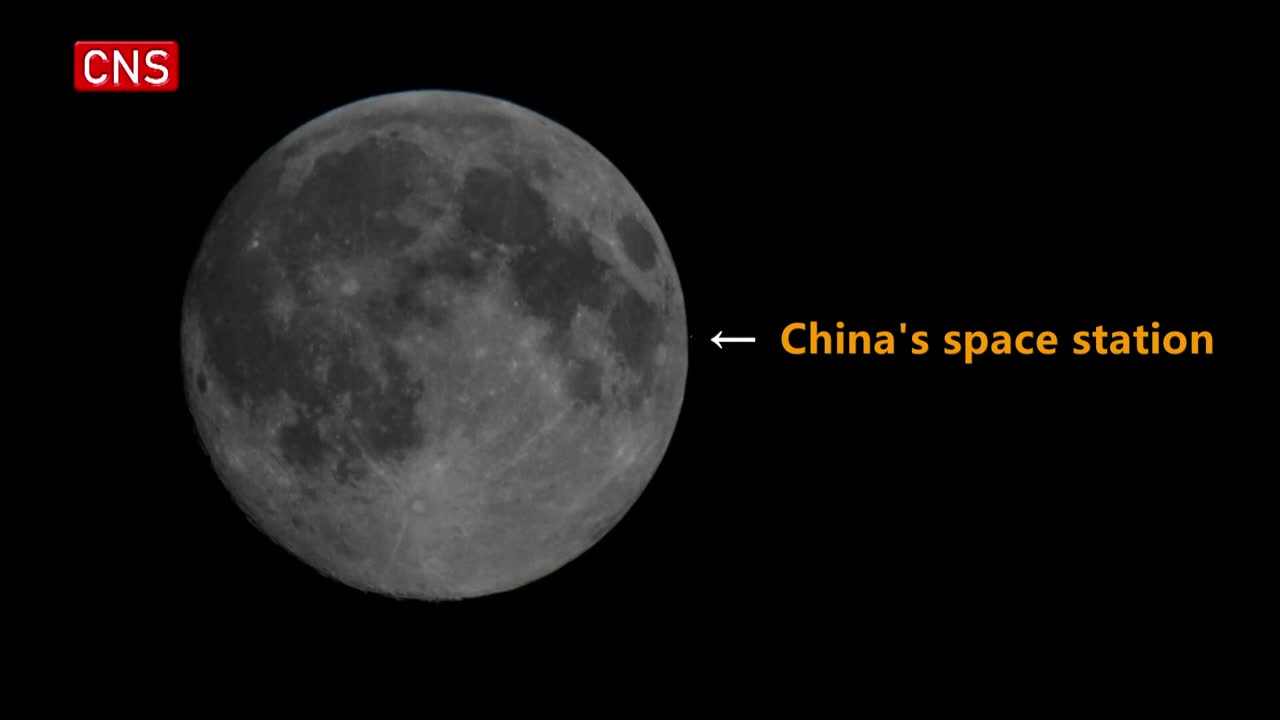 China's space station captured travelling in front of moon