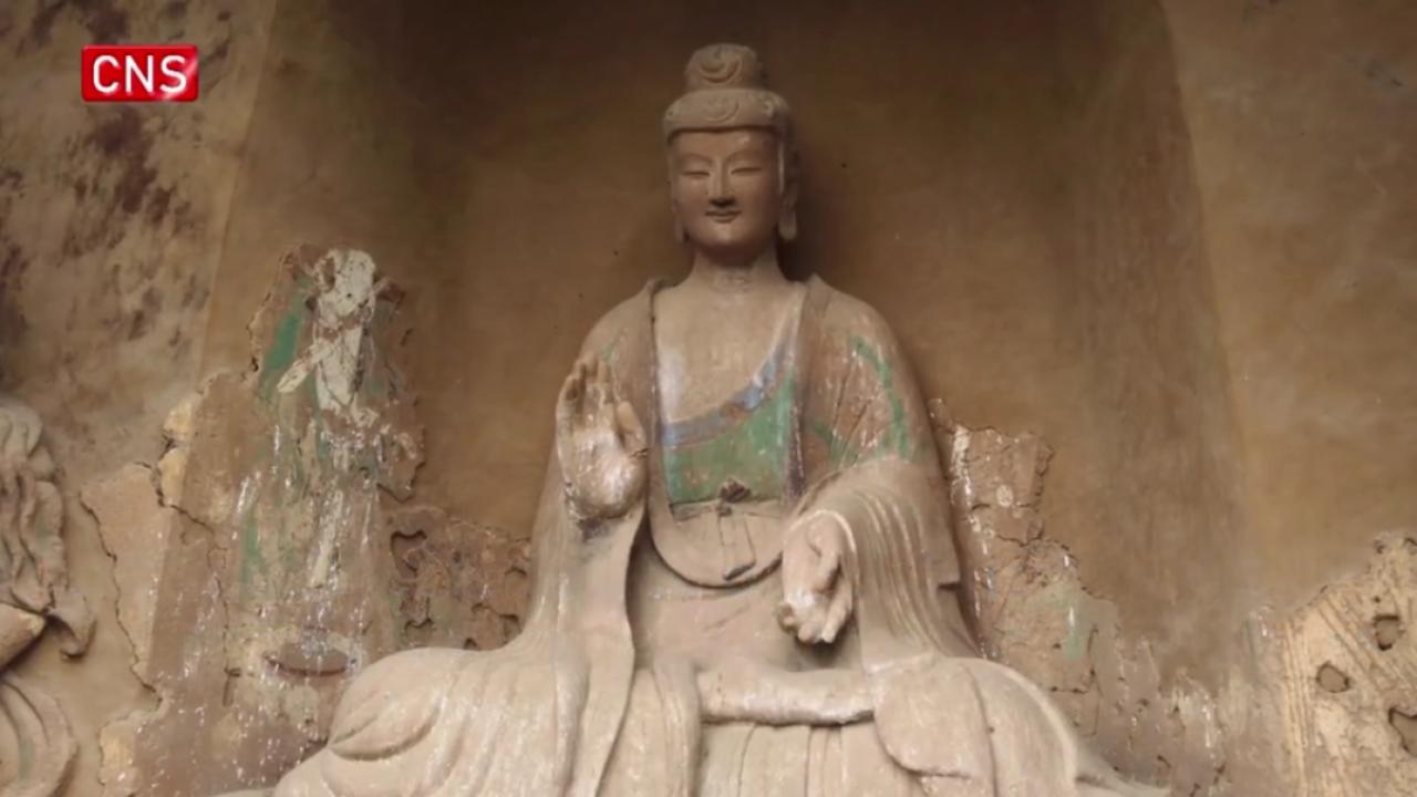 Statues with 'Oriental smile' in the millennium-old Maijishan Grottoes in Gansu