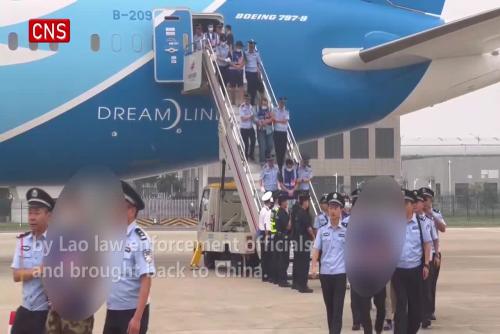 Fraud suspects escorted back to China from Laos