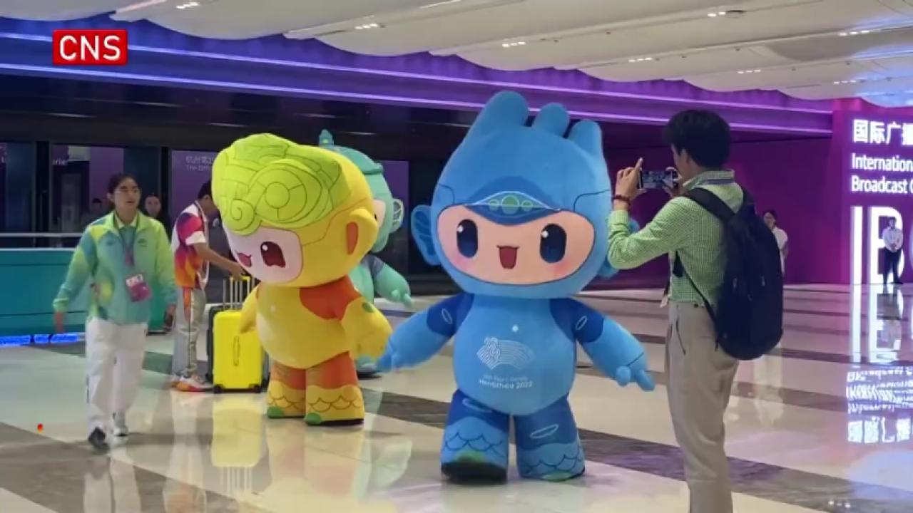 Mascots of 19th Asian Games catch people's eyes at Main Press Center 