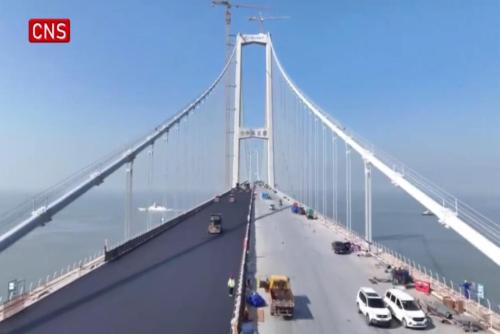 Lingdingyang Bridge, key part of Shenzhen-Zhongshan link, begins deck paving