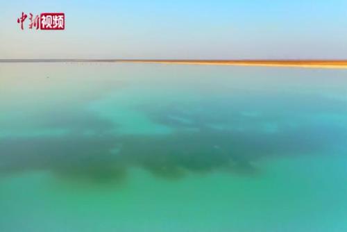 航拍“多巴胺”配色的新疆罗布泊盐湖