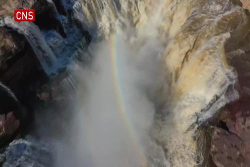 Double rainbow appears above Hukou Waterfall on Yellow River