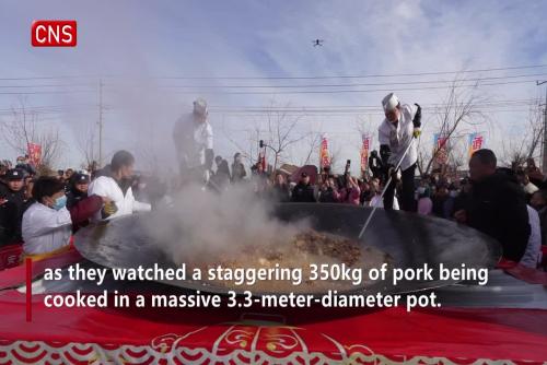 China's Inner Mongolia witnesses 350 kg pork stewed in a 3.3-meter-diameter pot