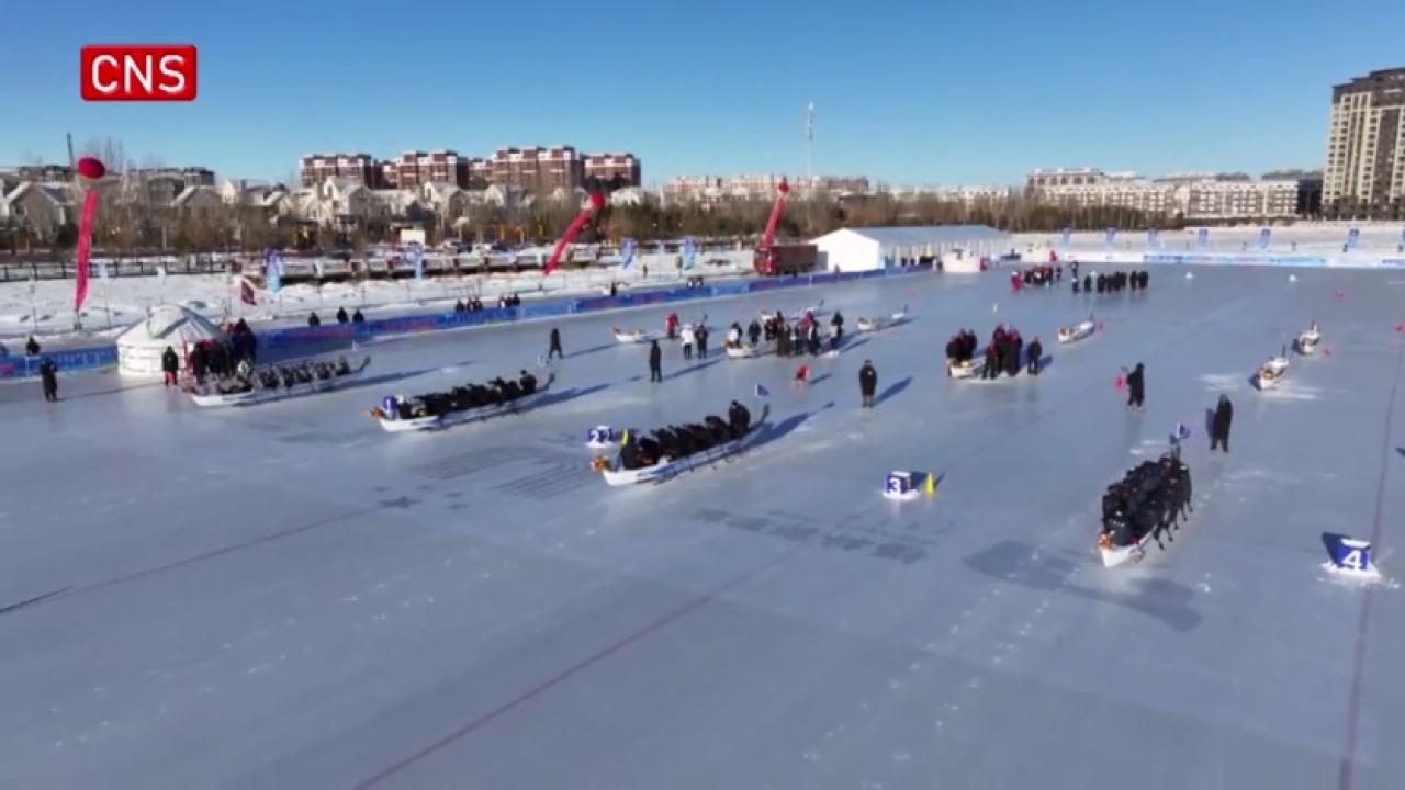 University students race dragon boats on ice in N China