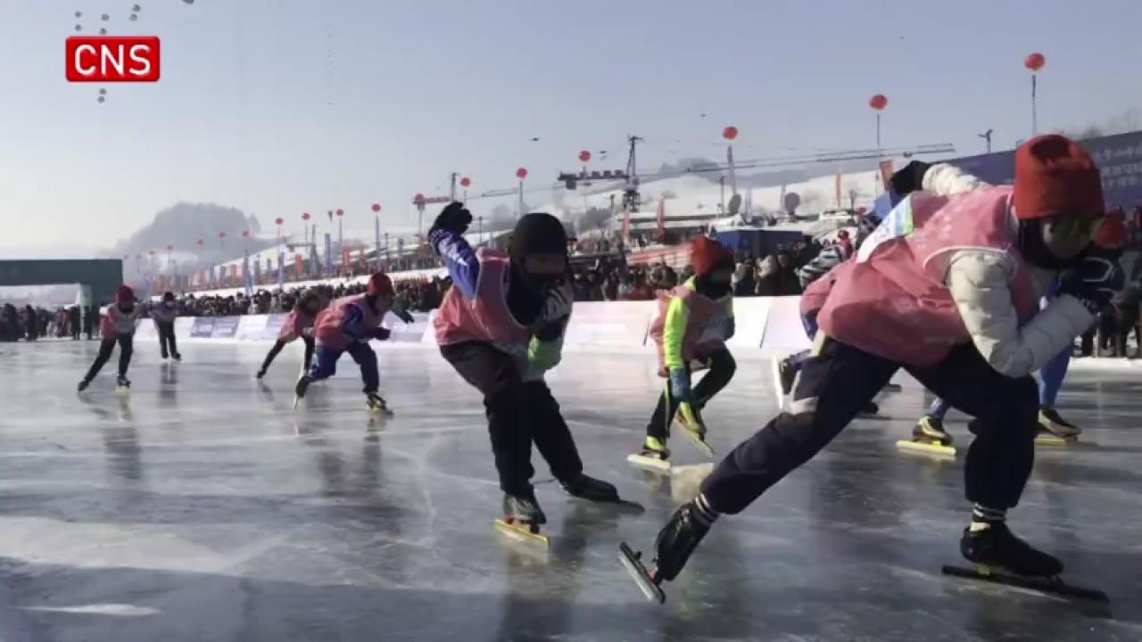 Contestants compete in skating marathon in NE China