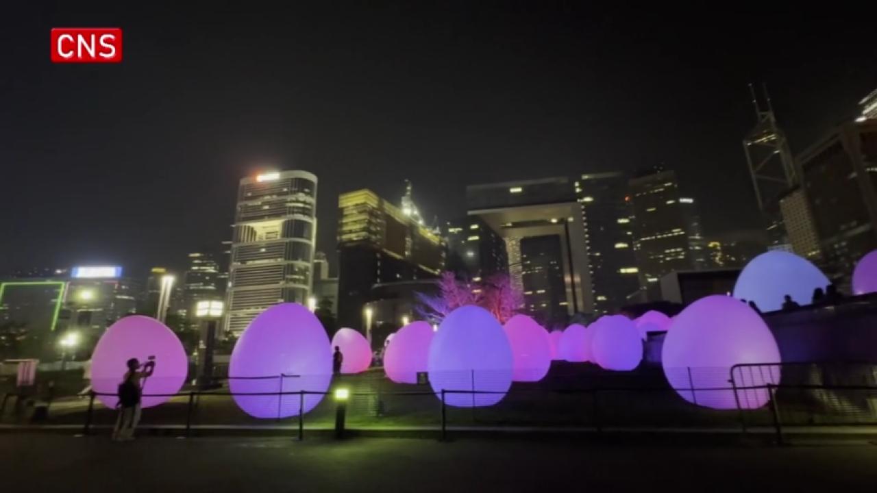 Hong Kong's Victoria Harbour illuminated by art installation of egg-shaped objects