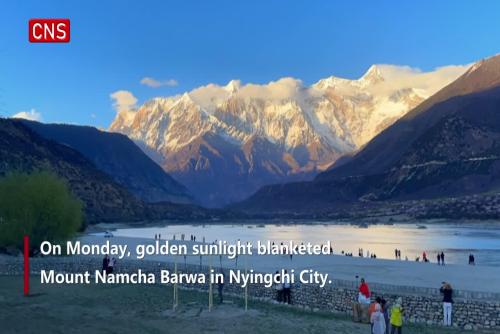 Time-lapse video: Golden sunshine on top of Mount Namcha Barwa