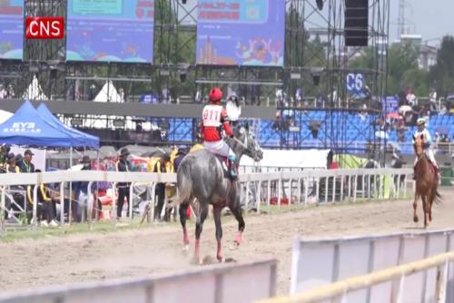 Traditional horse race held at 'Third Month Fair' in Yunnan