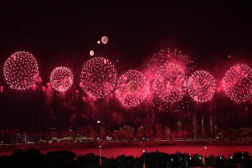 People across China celebrate National Day with fireworks, light shows