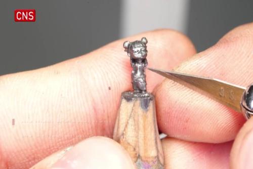 Man from China's Hebei carves pencil tip into Ne Zha art work