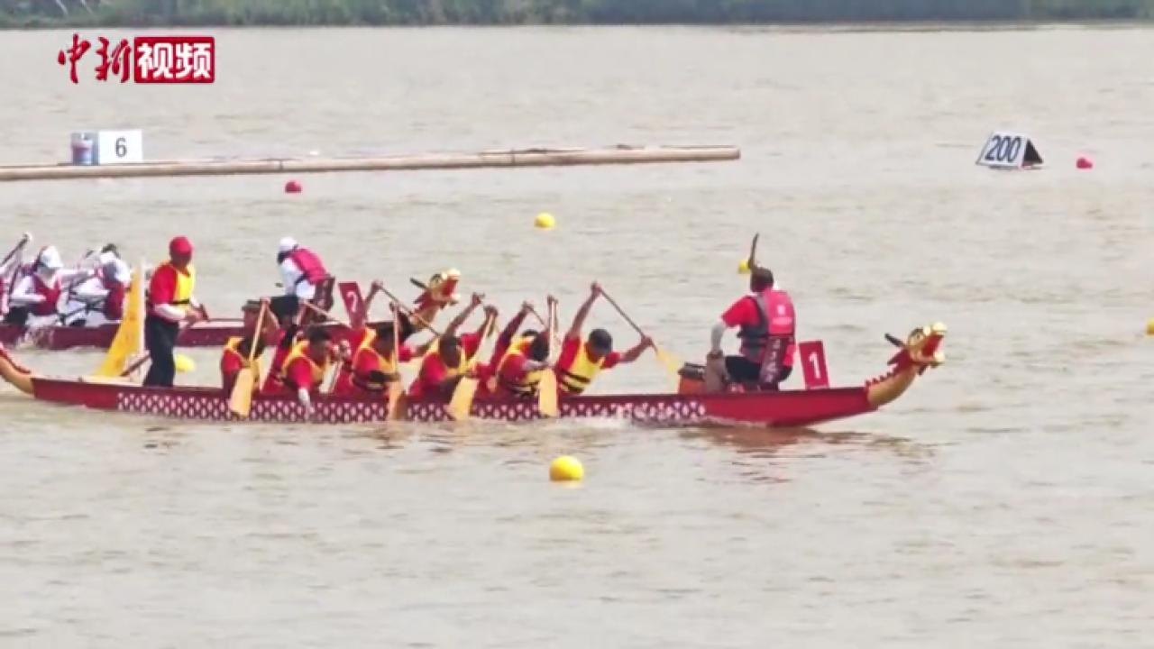 国际龙舟队湖南汨罗劈波竞渡 花甲女子龙舟队成焦点