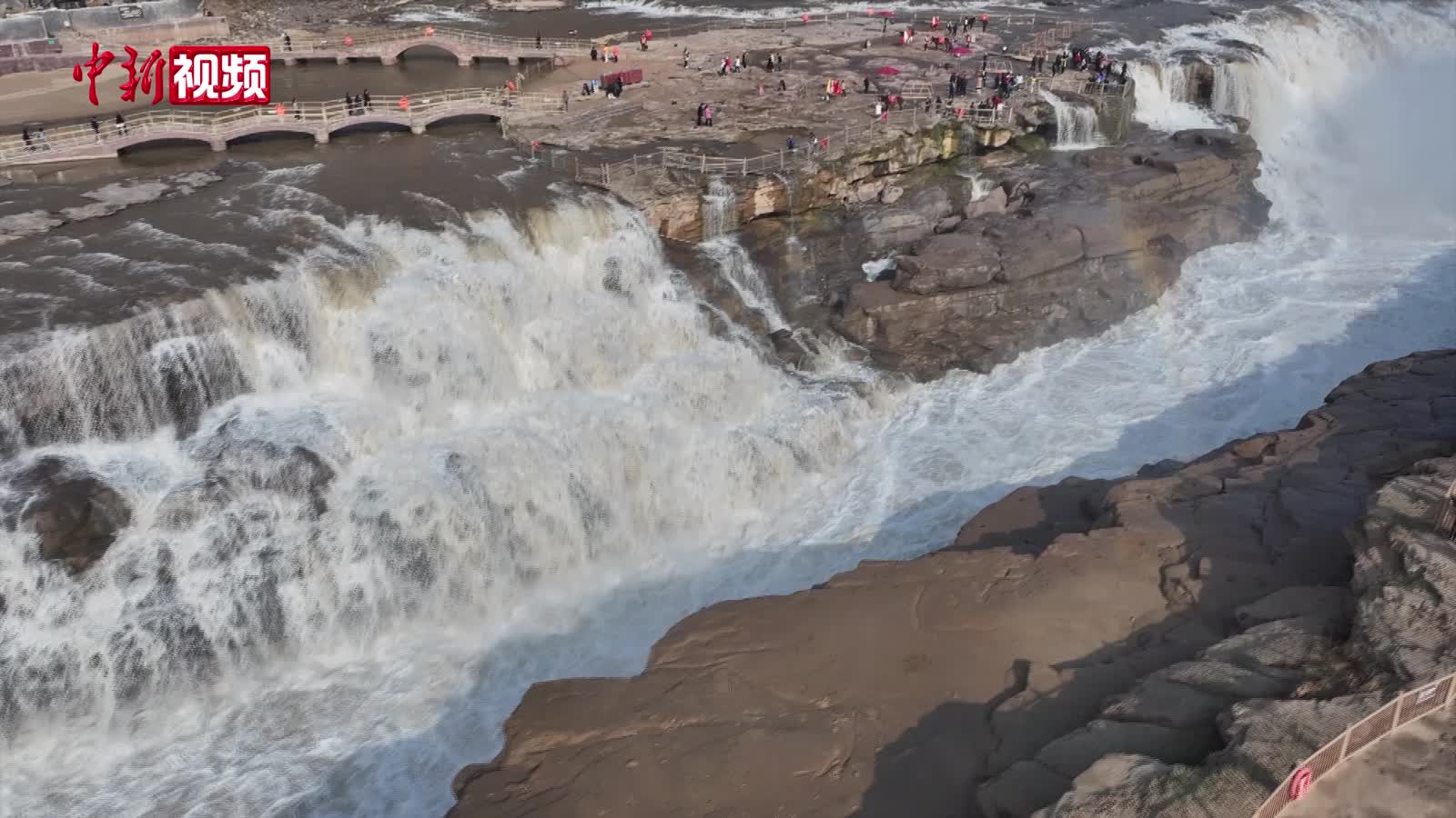 黃河壺口瀑布：“桃花汛”與彩虹同框