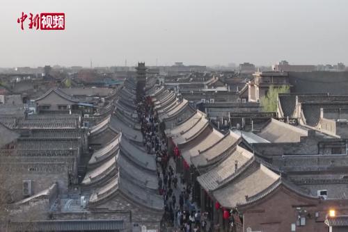 春日暖阳探古韵 平遥古城清明假期游人如织